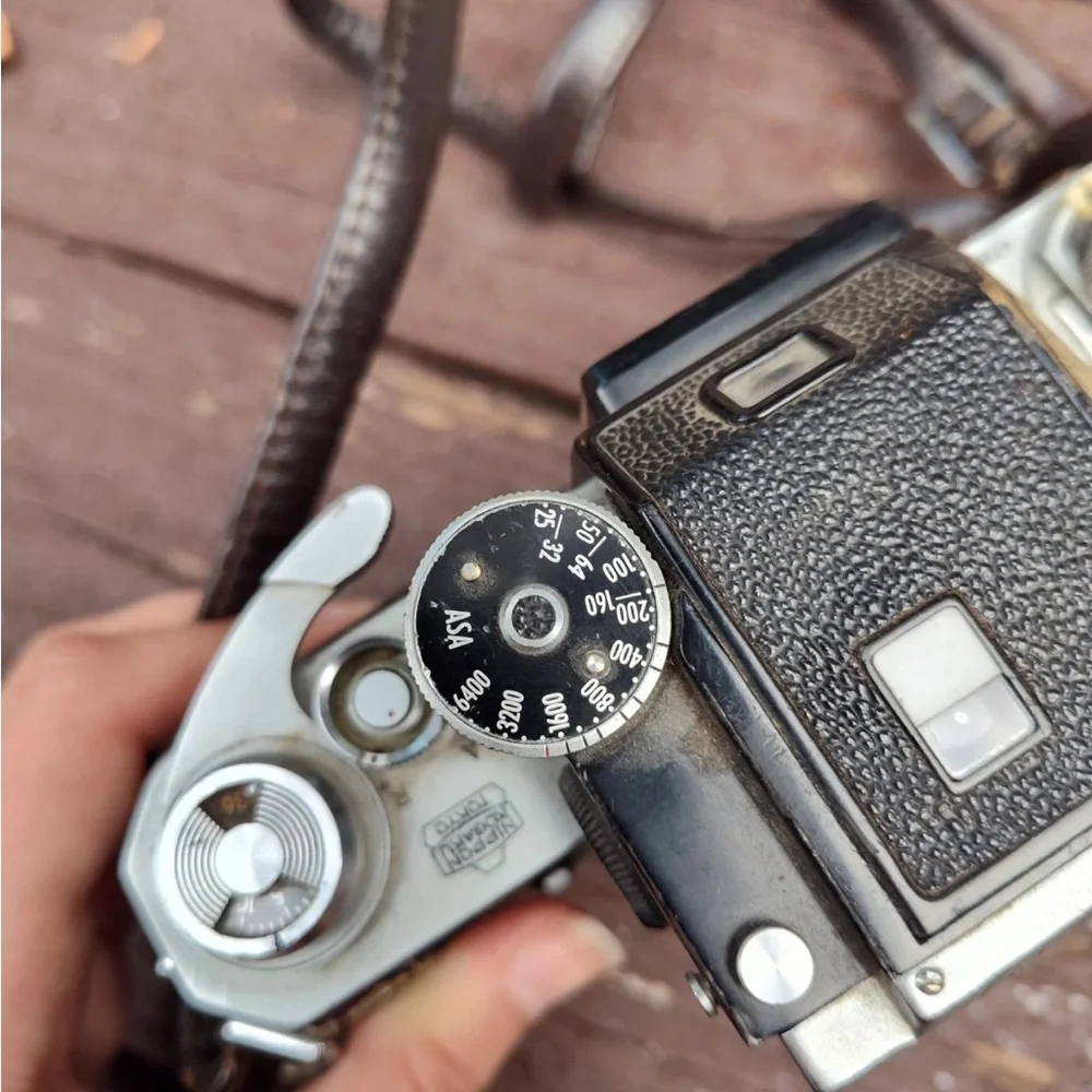 Nikon Vintage Black and Silver Camera Body